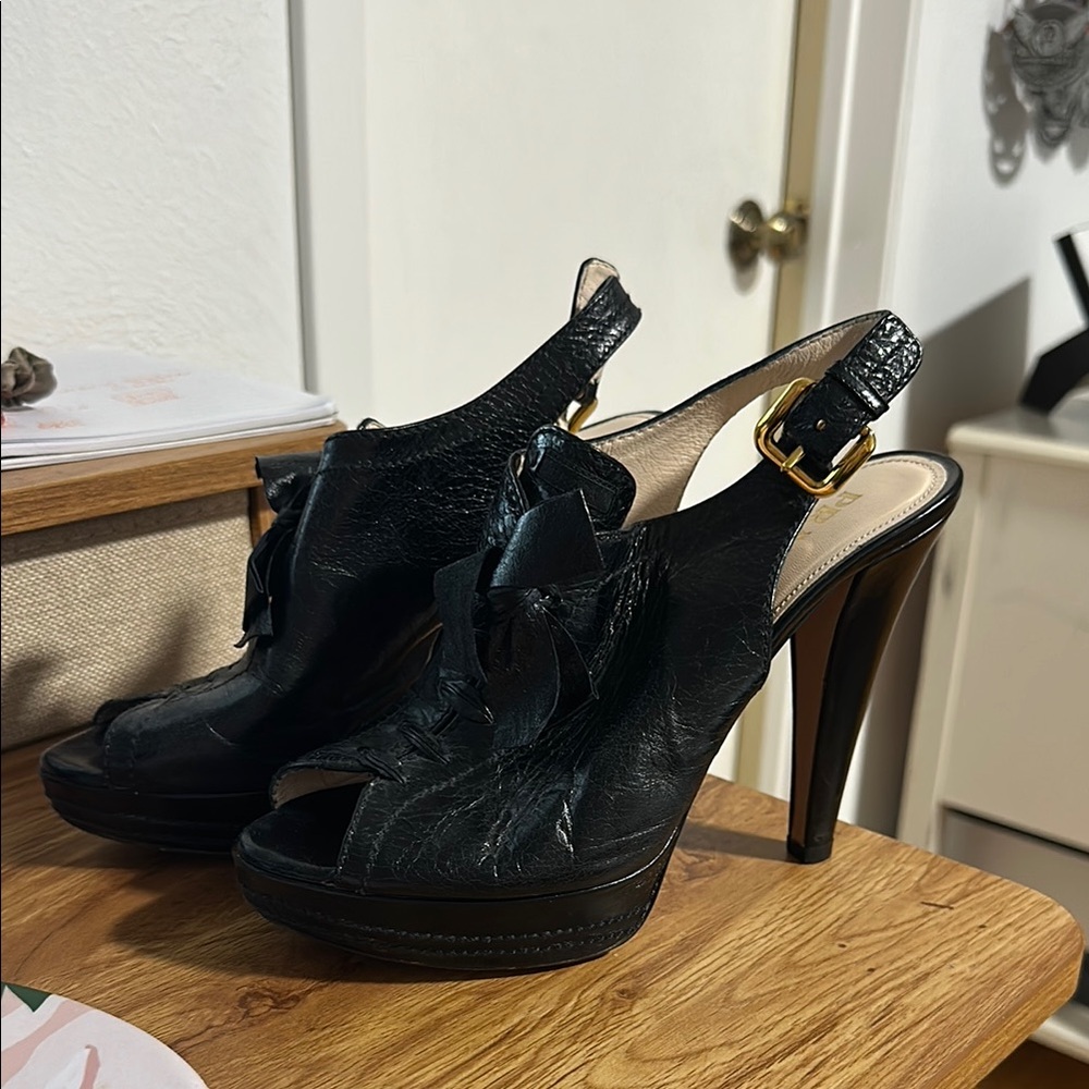 Prada black leather slingback heels